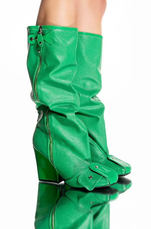 Knee high boots with a distressed finish​EMBELLISHED CHUNKY BOOT IN GREEN