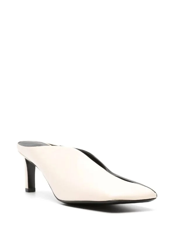 Women's Slip - On Leather Mules with Gold Buckles in Black for a Classic and Sophisticated StyleWomen's Two Tone Leather Mules In Champagne Women's Slip - On Leather Mules with Gold Buckles in Black for a Classic and Sophisticated StyleWomen's Two Tone Leather Mules In Champagne